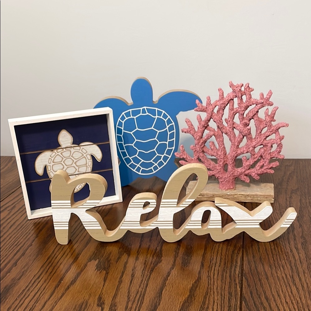 Gold 'Relax' Sign with Blue Turtle and Pink Coral Decor